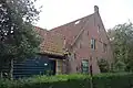 Boerderij met bakhuis, thans opgesplitst in 3 woningen[1]