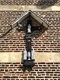 Crucifix aan de gevel