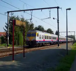 Een break verlaat Station Belsele