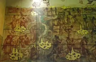 Links onder: moeder met kind tussen de graven van de Eerste Wereldoorlog.