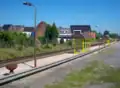 Perron 1 (gelegen aan de andere zijde van de overweg)
