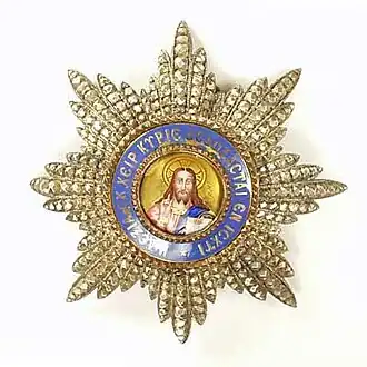 Ster van de Orde van de Verlosser Bij deze ster die uit zilver is vervaardigd geven de facetten de indruk dat de ster met briljanten bezet is