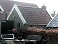 Boerderij in ambachtelijk-traditionele stijl, stookhut