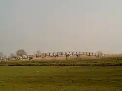 Streefkerk, fietsbrug in polderlandschap
