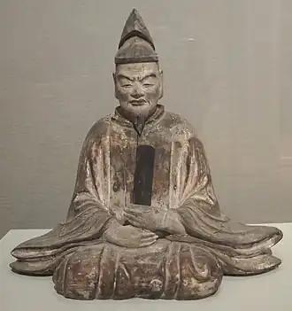 Houtsculptuur Sugawara no Michizane, 15e/16e eeuw.