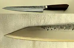 Tadafusa Hocho Sujihiki, Aogami #2 staal 63 HRc + twee lagen roestvast staal, lemmet ongepolijste Nashiji finish, westers handvat van Walnoothout, lemmetlengte 24 cm., Japans geslepen, slijphoek 2 * 15 graden.