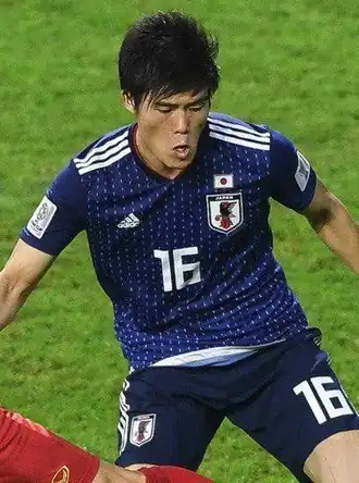 Tomiyasu in 2019 als speler van Japan