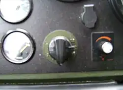 Om over te schakelen op normale verlichting moet de pal rechts op de schakelaar worden ingedrukt.