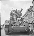 Een Britse tank op 3 september 1944 in de straten van Leuze