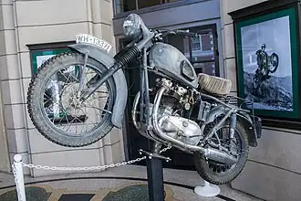 De TR6C Trophy vermomd als Duitse motorfiets, gebruikt door Bud Ekins en Steve McQueen in The Great Escape. Om de machine "ouder" te maken was een voorspatbord van een Speed Twin gemonteerd.