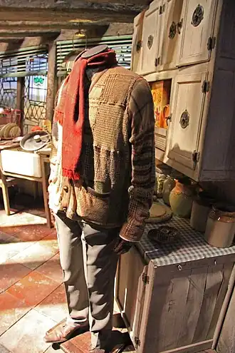 Kledij van Arthur Wemel