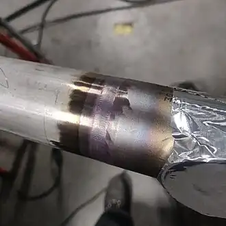 voorbeeld van piping met tegengas zonder toevoegmateriaal