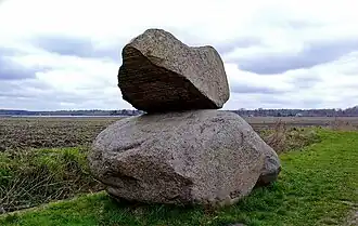 De Gewichtheffer door Ton Kalle in het landschap tussen Drouwen, Bronneger en Borger