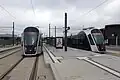 Twee CAF Urbos 3 trams