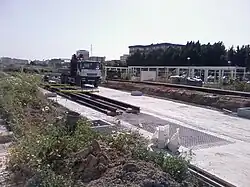 Aanleg bovengrondse lijn in de Teatinoswijk
