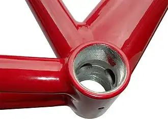 Bracket van een fietsframe waarin de trapas wordt gemonteerd.