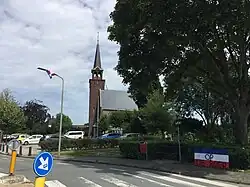 Een omgekeerde vlag met de tekst "Trots op de boer" (juli 2022)