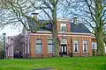 Winkelwoning met eclectische invloeden