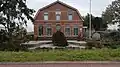 Woning met bedrijfsruimte (voormalige Kwekerswoning met bollenschuur)[1]