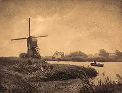 Pigmo-overdruk, ca 1920, molen met roeier