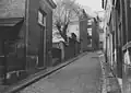 Zicht vanuit de Houtstraat in de richting van de Grote Markt (de Scheidemakersgas), 1931