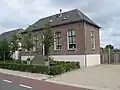 Vrijstaande woning, voormalig gemeentehuis
