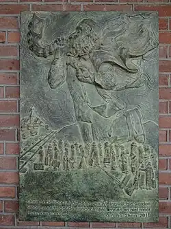 Plaquette op het station