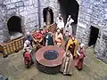 Reënactment op de binnenplaats van de donjon