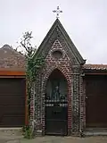 Wegkapel van 1873 toegewijd aan Onze-Lieve-Vrouw troosteres der bedrukten