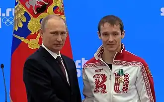 Zacharov (rechts) samen met president Poetin