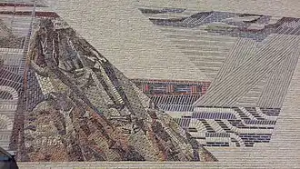 Voorgevel met bakstenen mozaïek