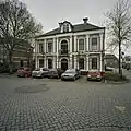 Voormalig gemeentehuis annex secretariswoning van de vroegere gemeente Warmenhuizen