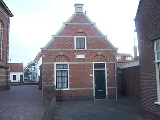 Diaconiegebouw naast Nieuwe Kerk in Katwijk, die ook ontworpen is door Jesse.