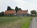 Twee lage boerenarbeidershuizen