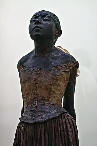 Detail uit La Petite Danseuse de Quatorze ans van Edgar Degas met Marie van Goethem als model