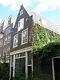 Koetshuis met bovenwoning