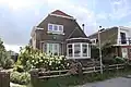 Woning (oorspronkelijk woonhuis). Woning.