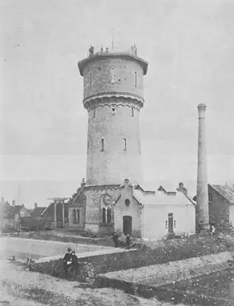 Watertoren van Sliedrecht, met onderaan Jan Schotel (1886)