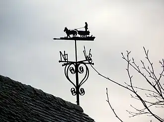 Windvaan op een huis in Tarrant Launceston