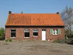 Wederopbouwhoeve, bij de Dienst der Verwoeste Gewesten gekend als de pachthoeve Gheyssens te Ieper