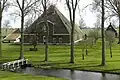 Stolpboerderij met staartstuk aan de achterzijde
