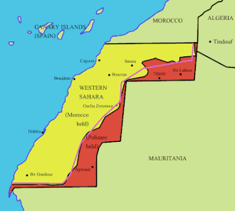 Het front tussen het door Marokko bezette deel (geel) en het door Polisario gecontroleerde deel (rood) van de Westelijke Sahara.