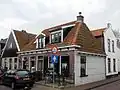 Bakkerij en bakkerswinkel, later schoenmakerij en schoenenwinkel