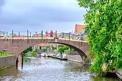 De Boog gezien over het water vanuit het westen