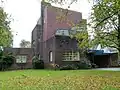 Villa in verstrakte Amsterdamse Schoolstijl