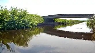 De Witakkersvaart in zuidwestelijke richting met brug, vanaf de Spookhoekstervaart