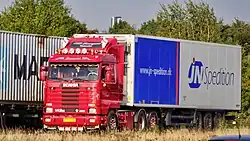 Scania R143M&nbsp;420 trekker met oplegger