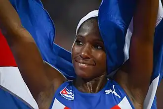Yarisley Silva viert haar wereldtitel van 2015 in Peking.