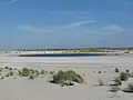 De Zandmotor ligt deels voor de kust van de wijk Ockenburgh.