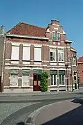 Ensemble van burgerhuis en winkel